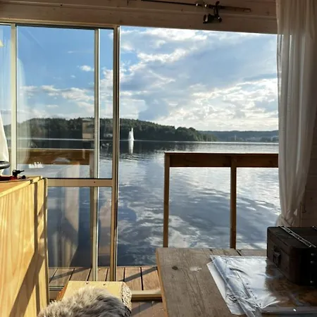 Saunaboat - Houseboat Laivamajoitukset Jyväskylä